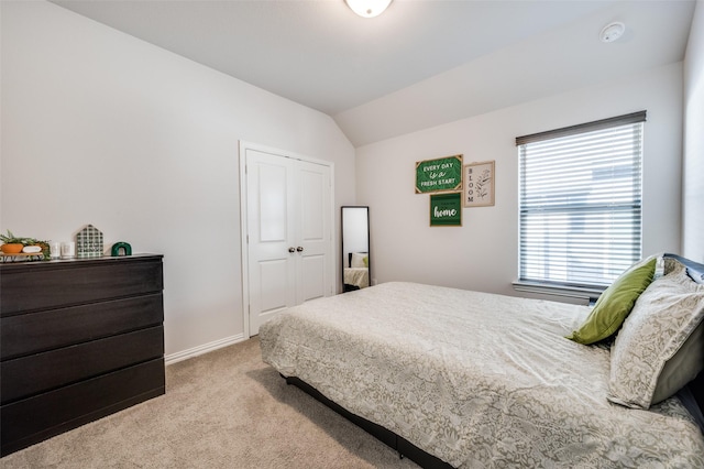 624 Cedarwood St, Little Elm, TX 76227 - bedroom featuring carpet floors, vaulted ceiling, baseboards, and a closet