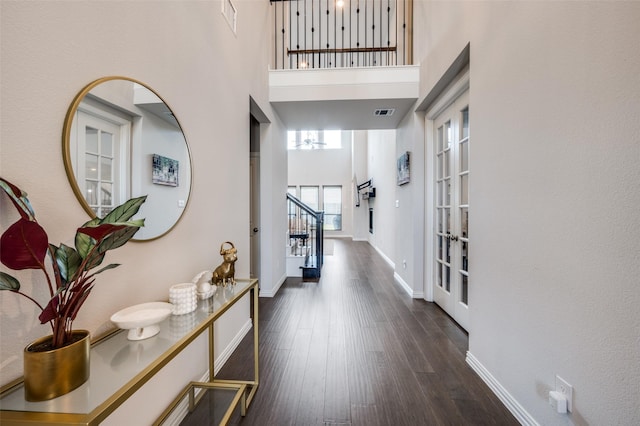 624 Cedarwood St, Little Elm, TX 76227 - entrance foyer featuring a high ceiling, stairs, dark wood-style floors, french doors, and baseboards