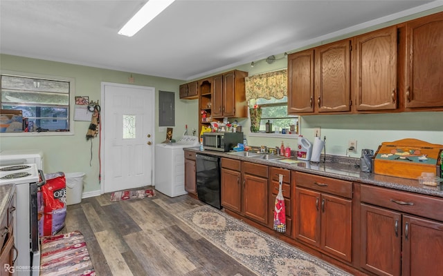 kitchen featuring washer / dryer, stainless steel microwave, a sink, electric panel, and dishwasher