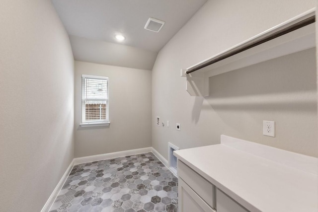 laundry area featuring hookup for an electric dryer, hookup for a washing machine, baseboards, cabinet space, and gas dryer hookup