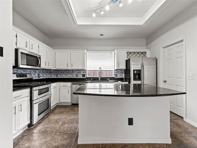3000 Clearmeadow Dr, Mesquite, TX 75181 - kitchen featuring stainless steel appliances, a sink, white cabinetry, and decorative backsplash