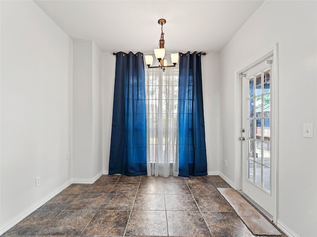 3000 Clearmeadow Dr, Mesquite, TX 75181 - spare room with a chandelier and baseboards