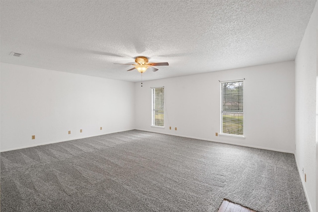 104 Murls Lake Rd, Weatherford, TX 76085 - unfurnished room featuring carpet, a ceiling fan, a textured ceiling, and baseboards