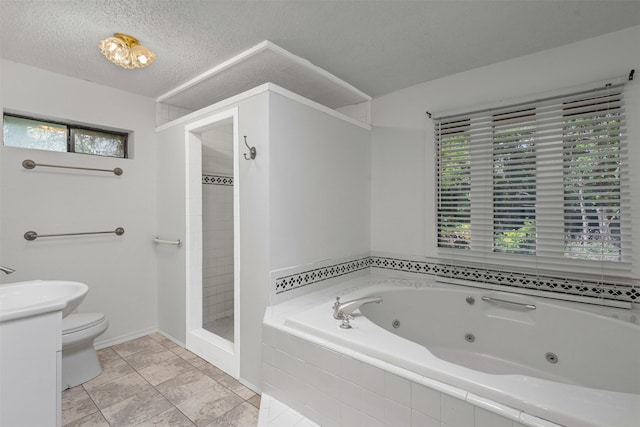 104 Murls Lake Rd, Weatherford, TX 76085 - bathroom featuring toilet, a shower stall, a jetted tub, vanity, and tile patterned flooring