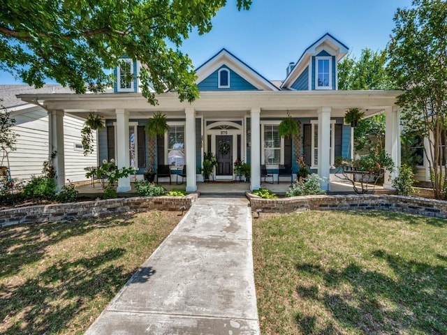 976 Fox Grove Ln, Providence Village, TX 76227 - view of front of house featuring a porch and a front yard