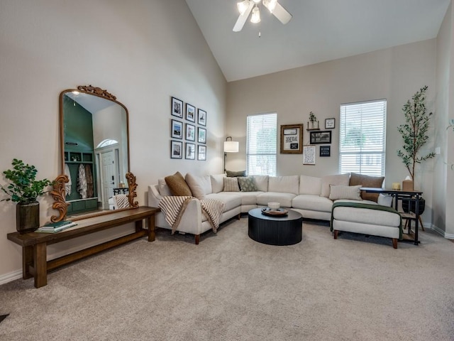 976 Fox Grove Ln, Providence Village, TX 76227 - carpeted living room with high vaulted ceiling, a ceiling fan, and baseboards