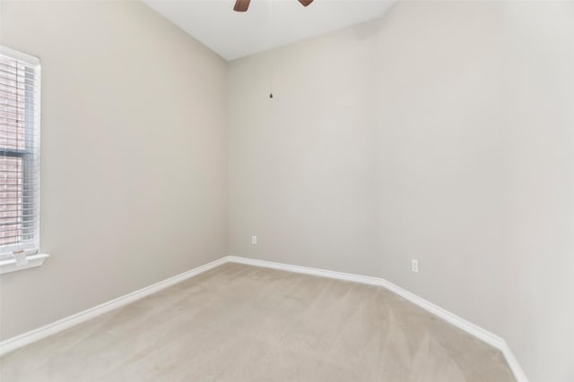 5900 Pansy Rd, Fort Worth, TX 76123 - empty room featuring light colored carpet, a ceiling fan, healthy amount of natural light, and baseboards