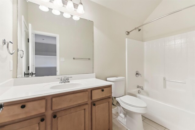 5900 Pansy Rd, Fort Worth, TX 76123 - full bathroom featuring tile patterned flooring, toilet, vanity, shower / tub combination, and lofted ceiling