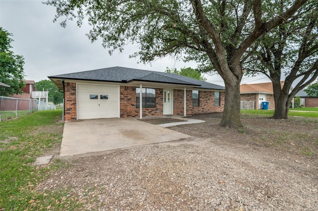 104 Bluebonnet Ln, Palmer, TX 75152 - ranch-style home featuring driveway, an attached garage, fence, roof with shingles, and brick siding