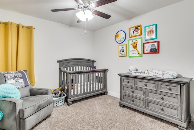 4014 Poplar Dr, Forney, TX 75126 - carpeted bedroom featuring a nursery area, ceiling fan, and baseboards