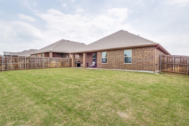 4014 Poplar Dr, Forney, TX 75126 - rear view of house featuring brick siding and roof with shingles