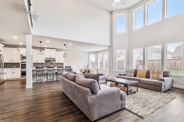 2540 Bottlebrush Dr, Prosper, TX 75078 - living room with a ceiling fan, dark wood finished floors, a high ceiling, recessed lighting, and baseboards