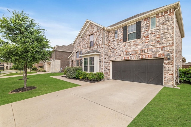 2540 Bottlebrush Dr, Prosper, TX 75078 - view of front of home featuring a garage, concrete driveway, and a front lawn