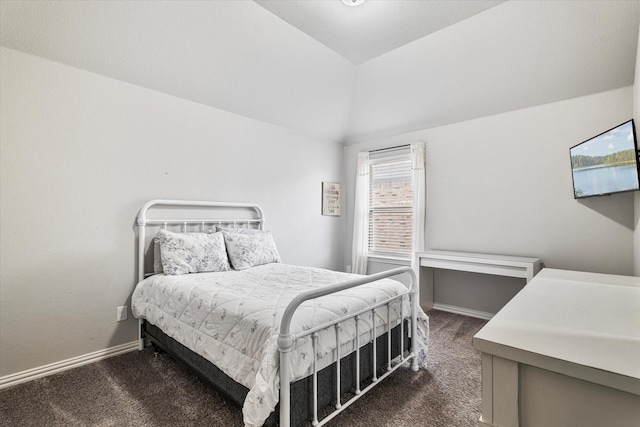 2540 Bottlebrush Dr, Prosper, TX 75078 - bedroom featuring dark carpet, lofted ceiling, and baseboards