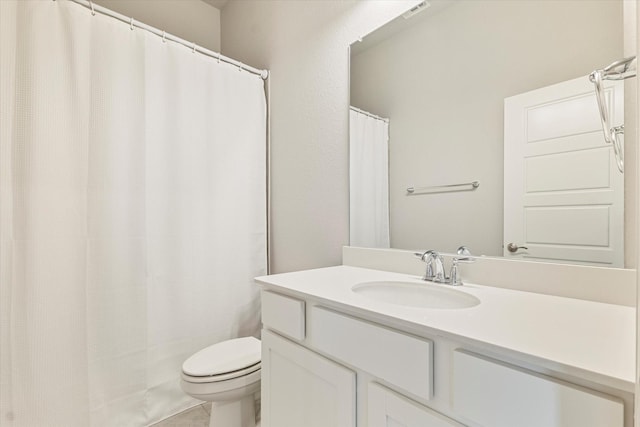 2540 Bottlebrush Dr, Prosper, TX 75078 - bathroom with toilet, vanity, and tile patterned floors