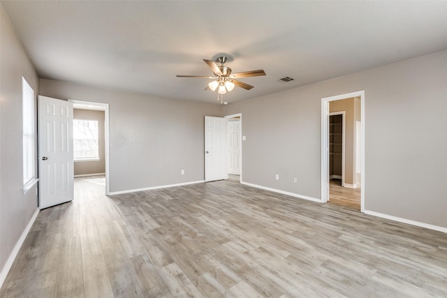 4032 Red Rock, Heartland, TX 75126 - empty room with ceiling fan, light wood-type flooring, and baseboards