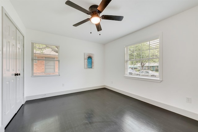 10166 San Lorenzo Dr, Dallas, TX 75228 - unfurnished room featuring healthy amount of natural light, baseboards, and ceiling fan