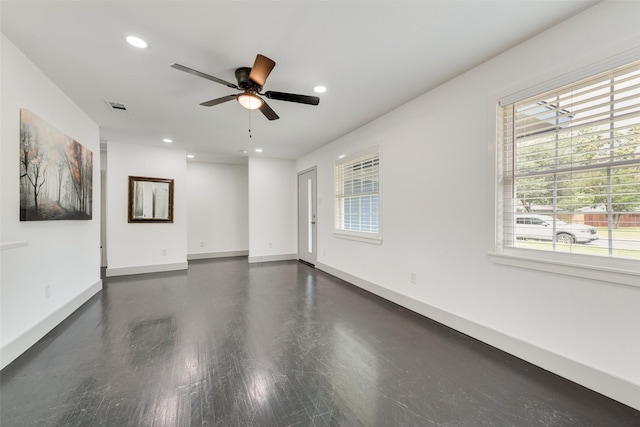 10166 San Lorenzo Dr, Dallas, TX 75228 - unfurnished room featuring healthy amount of natural light, ceiling fan, recessed lighting, baseboards, and wood finished floors