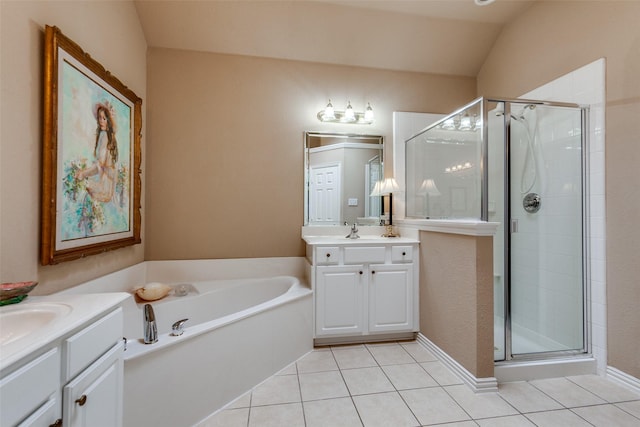 3671 Navarro Way, Frisco, TX 75034 - full bathroom with a stall shower, tile patterned flooring, a bath, and two vanities