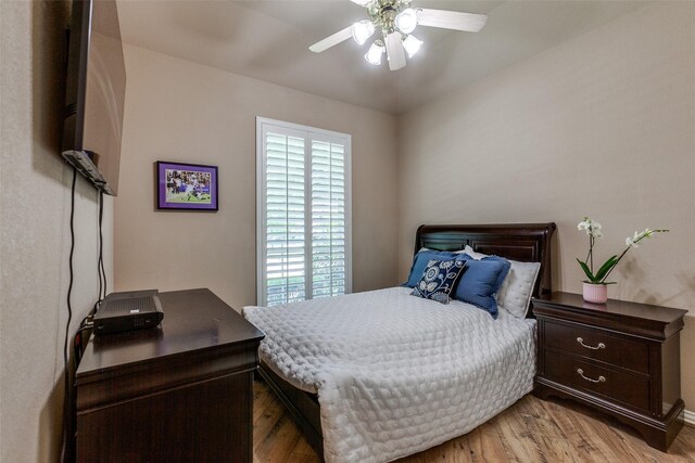 3671 Navarro Way, Frisco, TX 75034 - bedroom featuring light wood finished floors and a ceiling fan
