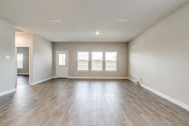 600 Trinity Park Trl, Alvarado, TX 76009 - empty room featuring wood finished floors, baseboards, and recessed lighting