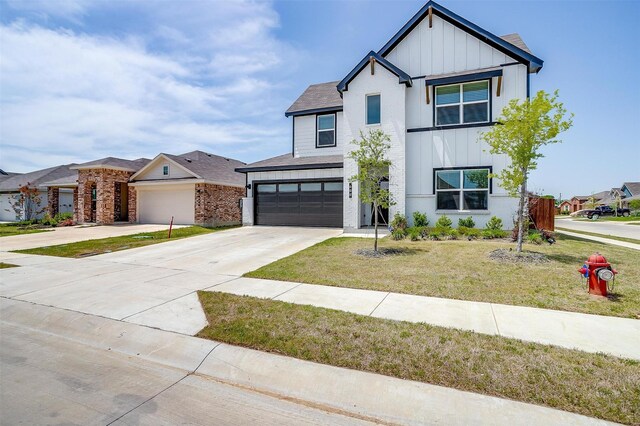 600 Trinity Park Trl, Alvarado, TX 76009 - modern farmhouse style home with board and batten siding, a front yard, concrete driveway, brick siding, and a garage