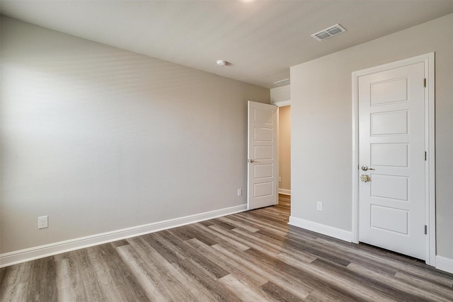 600 Trinity Park Trl, Alvarado, TX 76009 - unfurnished bedroom with wood finished floors and baseboards