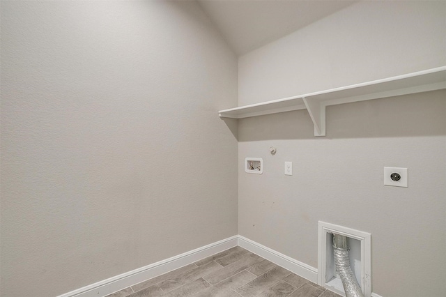 600 Trinity Park Trl, Alvarado, TX 76009 - clothes washing area featuring electric dryer hookup, hookup for a gas dryer, washer hookup, wood finish floors, and baseboards
