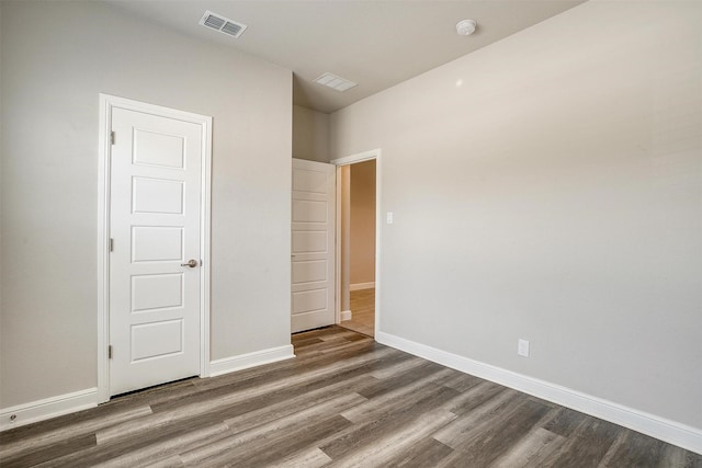 600 Trinity Park Trl, Alvarado, TX 76009 - unfurnished bedroom with wood finished floors and baseboards