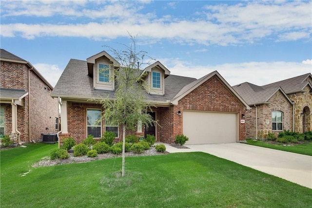 3804 Tunstall Dr, Frisco, TX 75036 - view of front of house with brick siding, a garage, a front lawn, concrete driveway, and a shingled roof