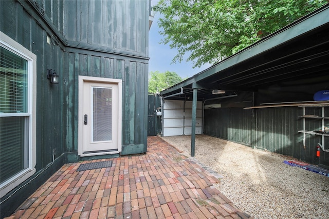 entrance to property featuring a patio area