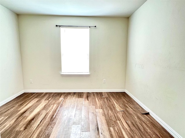 710 S 20th St, Temple, TX 76501 - spare room featuring wood finished floors and baseboards