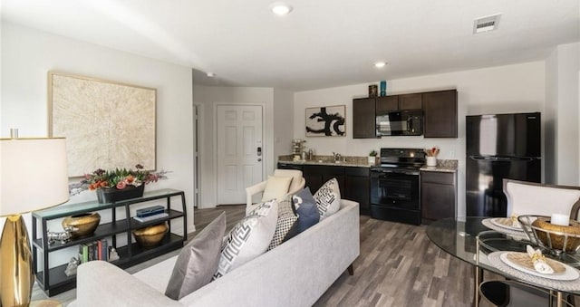 710 S 20th St, Temple, TX 76501 - living area with dark wood-style floors and recessed lighting