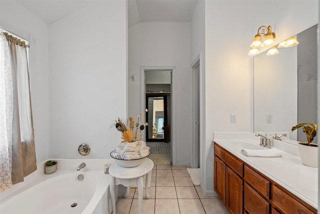 221 Whitestone Way, Weatherford, TX 76085 - bathroom featuring a garden tub, vanity, tile patterned flooring, and plenty of natural light