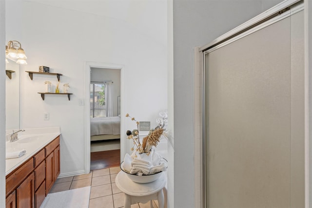 221 Whitestone Way, Weatherford, TX 76085 - ensuite bathroom with vanity, a shower stall, and tile patterned flooring