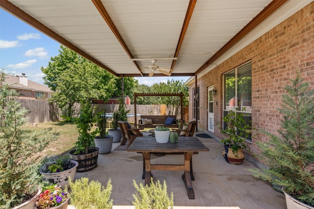 221 Whitestone Way, Weatherford, TX 76085 - fenced backyard with a ceiling fan, a patio, and outdoor lounge area