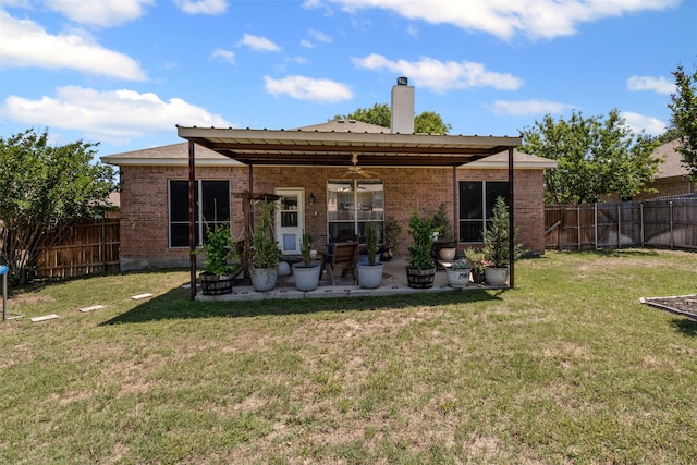 221 Whitestone Way, Weatherford, TX 76085 - rear view of property with a ceiling fan, a chimney, brick siding, and a patio