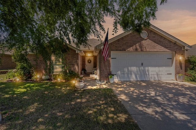 221 Whitestone Way, Weatherford, TX 76085 - view of front of property with brick siding, concrete driveway, a garage, and a yard
