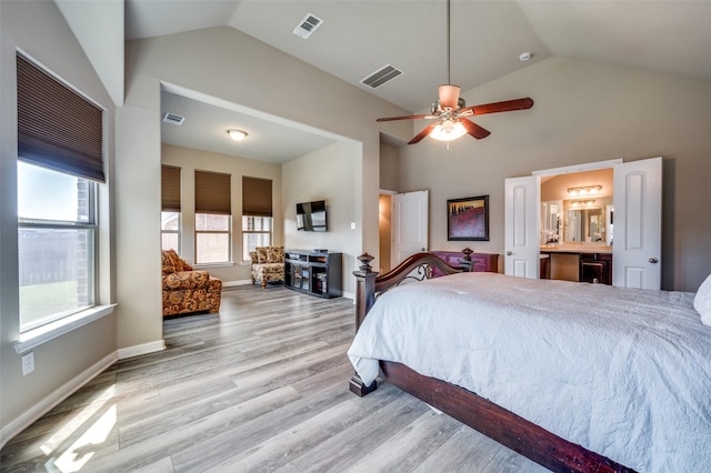 2617 Castle Creek Dr, Little Elm, TX 75068 - bedroom with high vaulted ceiling, light wood-type flooring, connected bathroom, baseboards, and ceiling fan