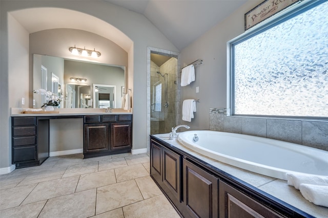 2617 Castle Creek Dr, Little Elm, TX 75068 - full bathroom with a shower stall, healthy amount of natural light, vanity, a garden tub, and vaulted ceiling