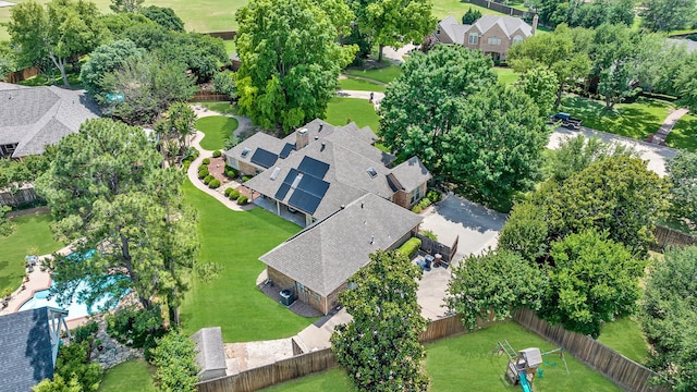 aerial view of property's location with nearby suburban area