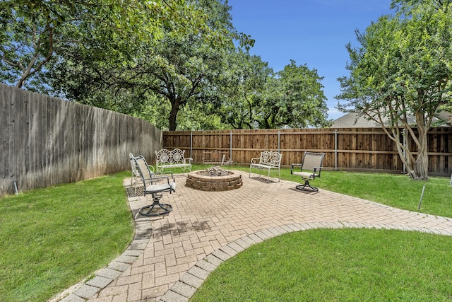 5403 Linden Ct, Colleyville, TX 76034 - fenced backyard featuring an outdoor fire pit and a patio area