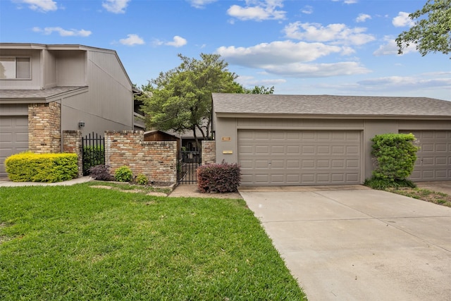 10607 Hillpoint Dr, Dallas, TX 75238 - view of front of property featuring a gate, concrete driveway, an attached garage, and a shingled roof