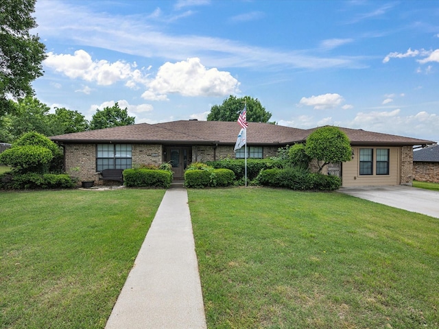 402 Brookview Dr, Decatur, TX 76234 - ranch-style house featuring a front yard and brick siding