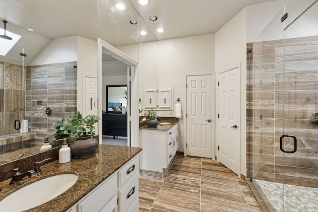 1141 Yorkshire Dr, Carrollton, TX 75007 - full bathroom featuring vanity, recessed lighting, a stall shower, and vaulted ceiling