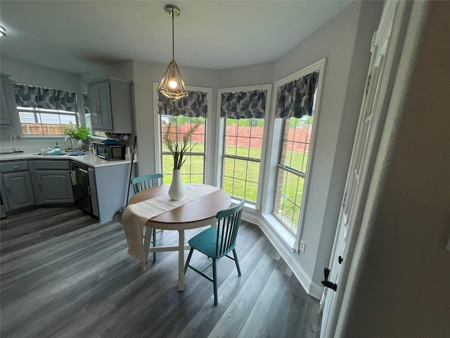 2004 Willowcrest, Kaufman, TX 75142 - dining area with healthy amount of natural light, dark wood-type flooring, and baseboards