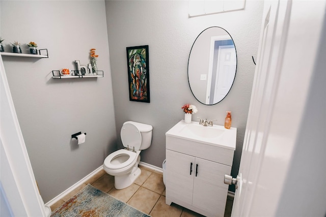 1433 Sun Breeze Dr, Little Elm, TX 75068 - bathroom featuring tile patterned flooring, toilet, vanity, and baseboards