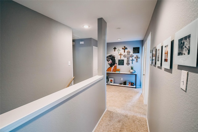 1433 Sun Breeze Dr, Little Elm, TX 75068 - hall with carpet, a textured wall, and an upstairs landing