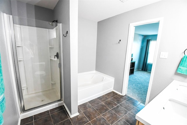 1433 Sun Breeze Dr, Little Elm, TX 75068 - full bath featuring a stall shower, a bath, double vanity, and baseboards