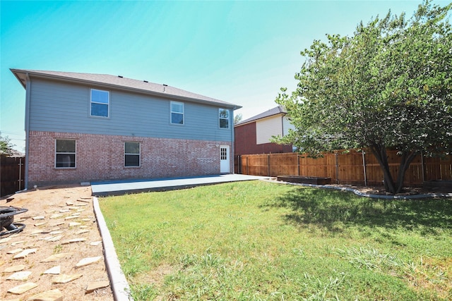 1433 Sun Breeze Dr, Little Elm, TX 75068 - back of property with brick siding and a patio